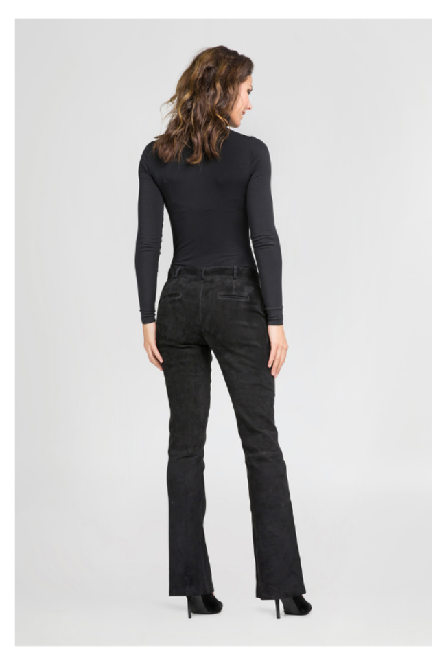 ZINGA Leather Discover Model Flo: handcrafted leather bootcut trousers made from soft, flexible stretch lamb leather. Featuring a feminine fit, luxurious finish and timeless style. Explore the collection.