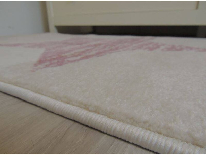Tapijt babykamer met zachte kleuren en ster