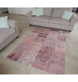 Roze vintage tapijt met patchwork motief