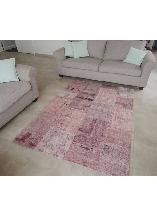 Roze vintage tapijt met patchwork motief