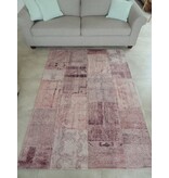 Roze vintage tapijt met patchwork motief