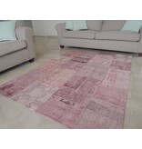 Roze vintage tapijt met patchwork motief