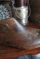 Oude houten schoenen mal
