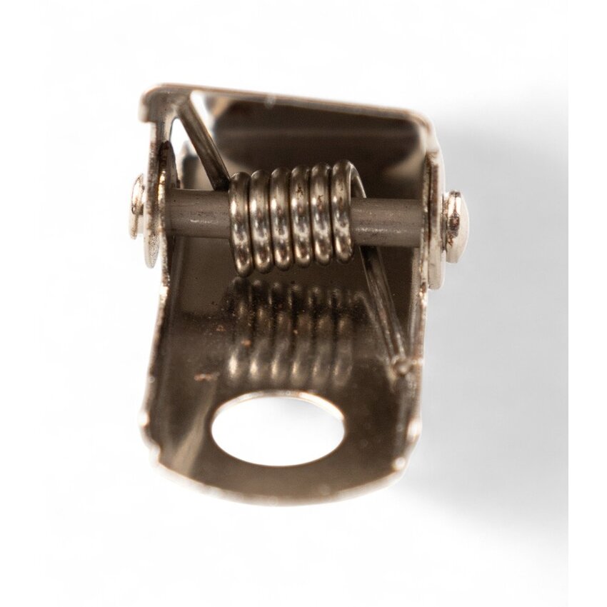 Metal clip with perforation