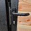 Dichte poort met houtvulling en stalen frame