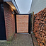 Dichte poort met houtvulling en stalen frame