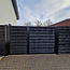 Dubbele houten poort met stalen frame