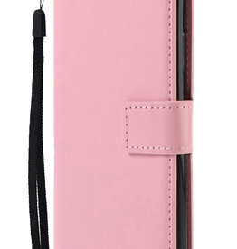 Nomfy Nomfy iPhone 14 Pro Hoesje Bookcase - Lichtroze