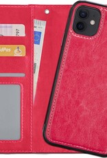 NoXx Hoes Geschikt voor iPhone 12 Hoesje Bookcase Hoes 2-in-1 Uitneembaar Cover Hard Case - Donkerroze