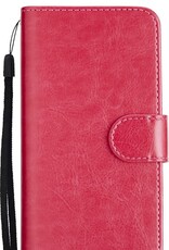 NoXx Hoes Geschikt voor iPhone 12 Hoesje Bookcase Hoes 2-in-1 Uitneembaar Cover Hard Case - Donkerroze