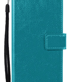 Nomfy Nomfy iPhone 15 Pro Hoesje Bookcase - Turquoise