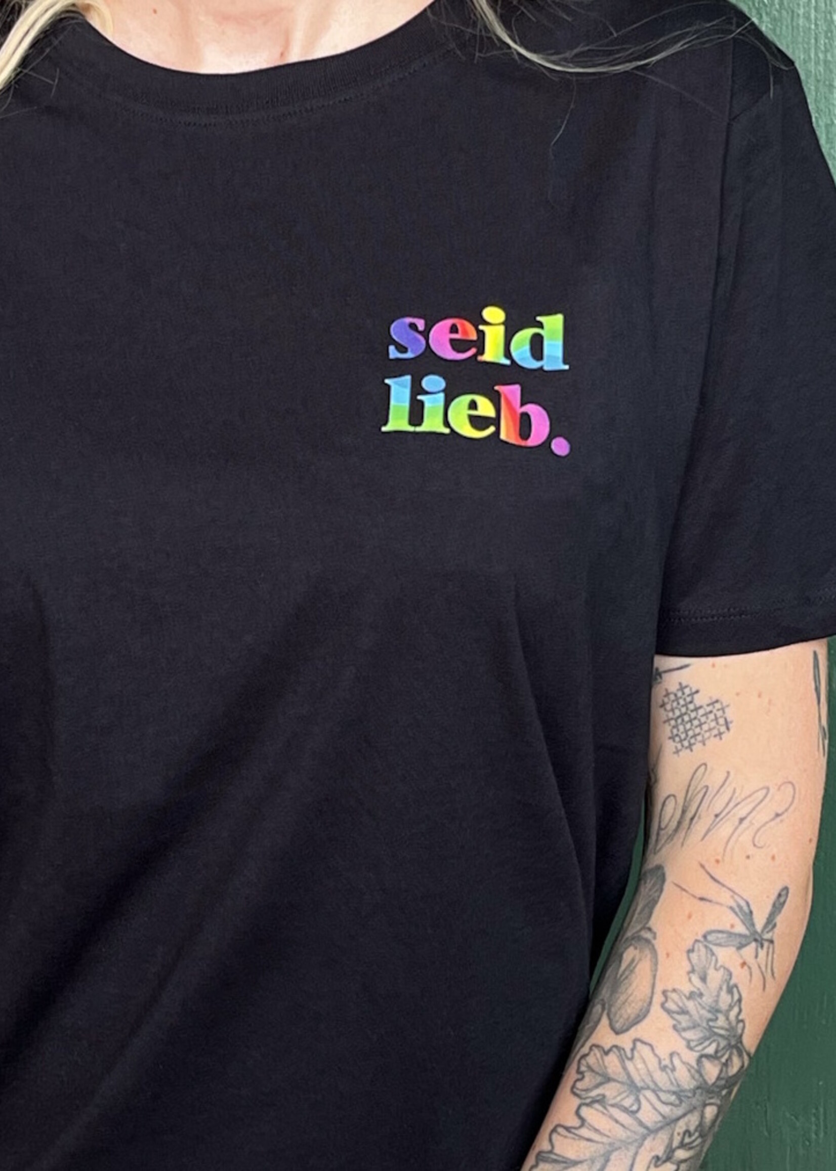 seid lieb.  cooperationshirt - straight cut with white on black lettering on the front