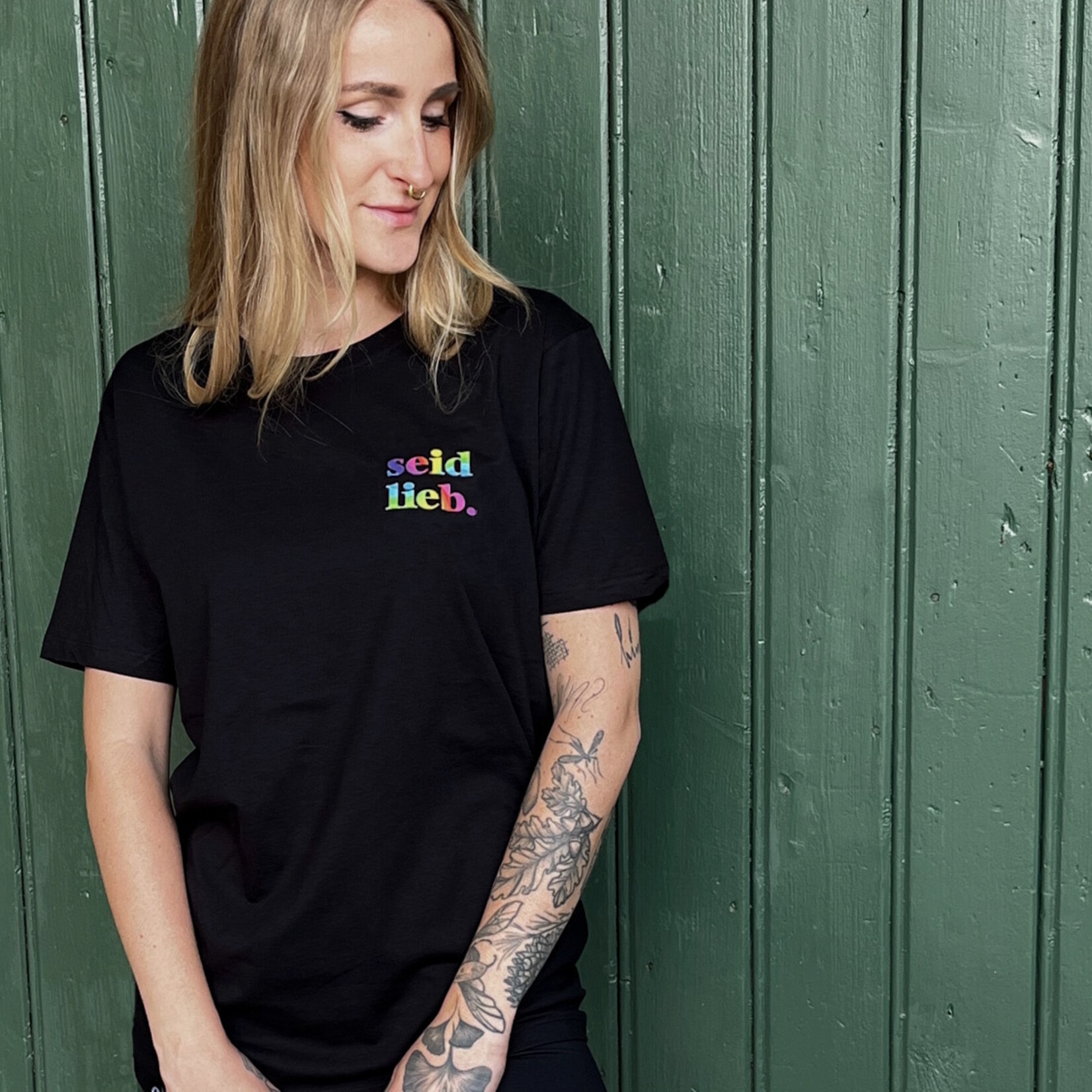 seid lieb.  cooperationshirt - straight cut with white on black lettering on the front