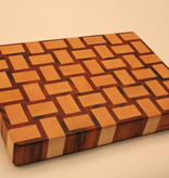 Kitchen Artwoods end grain cuttingboard with a woven patern of hard maple and tigerwood