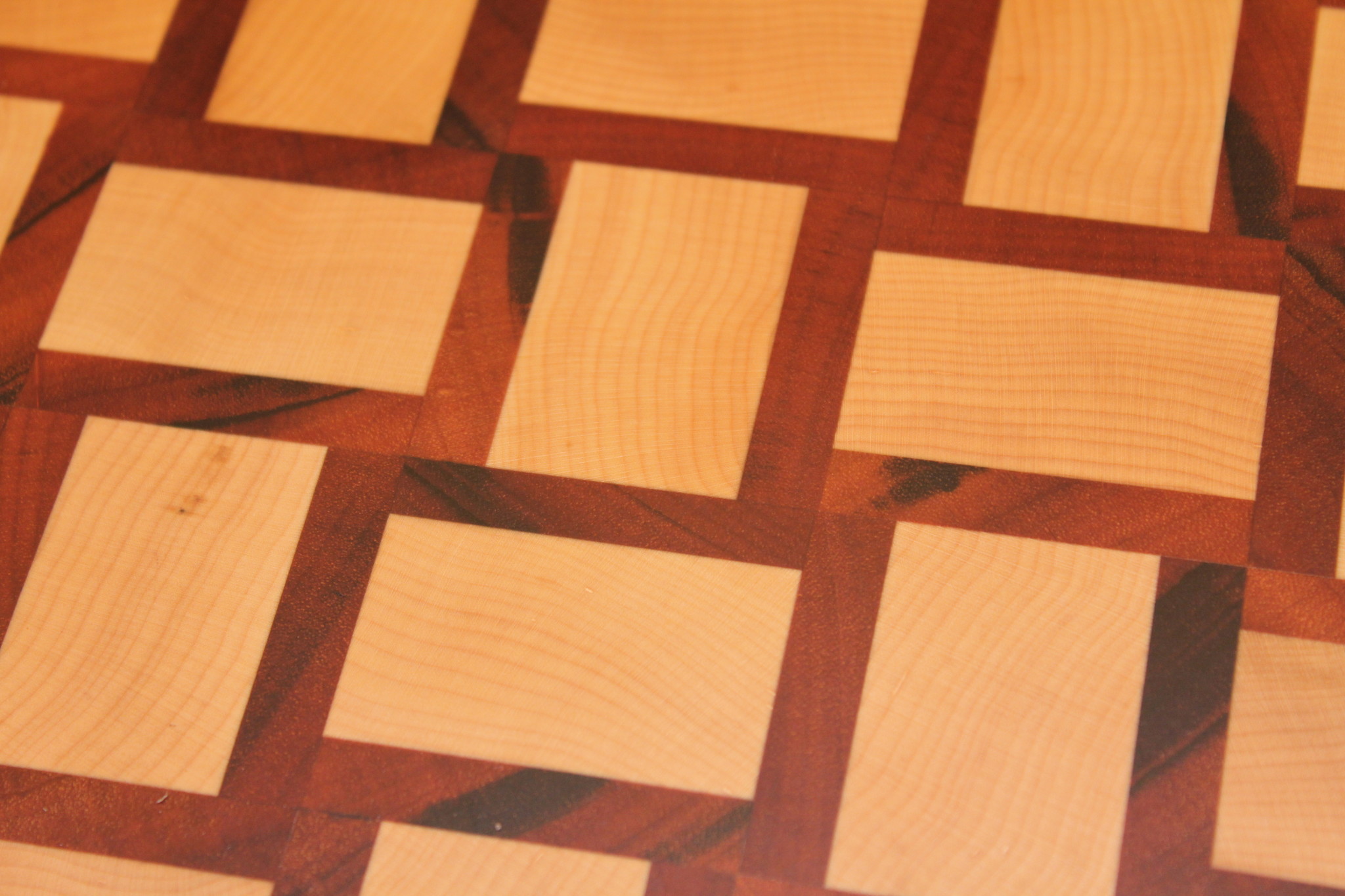 end grain cuttingboard with a woven patern of hard maple and tigerwood -  Kitchen artwoods