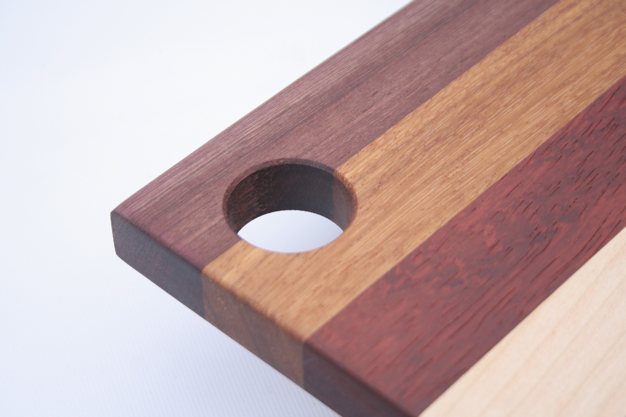 Colourful cheese Board, made of hard maple, paduk, afzelia and purpleheart, available in three sizes