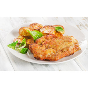 Schnitzel, sinaasappelsaus, groenten & zoete aa.puree