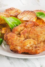 Vegetarische schnitzel met vega jus, spruiten en aardappelpuree