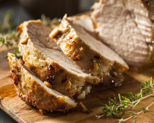 Varkenshaas in champignonsaus, witlof en aardappelgratin