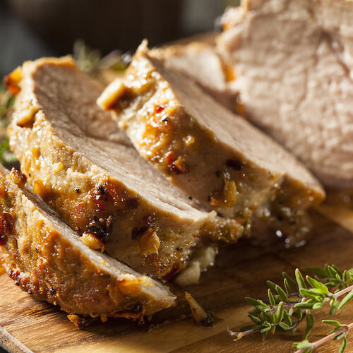Varkenshaas in champignonsaus, witlof en aardappelgratin