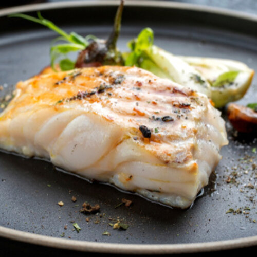 Heekfilet in botersaus, bladspinazie en tomatenrijst