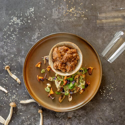 Coq au vin, stamppot bospaddenstoelen & rucola