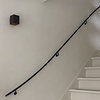 Smeedijzeren trapleuning op maat - ZWART - rond massief (20 mm) - incl. ronde leuninghouders (gelast) met rozet - coating zwart RAL 9005