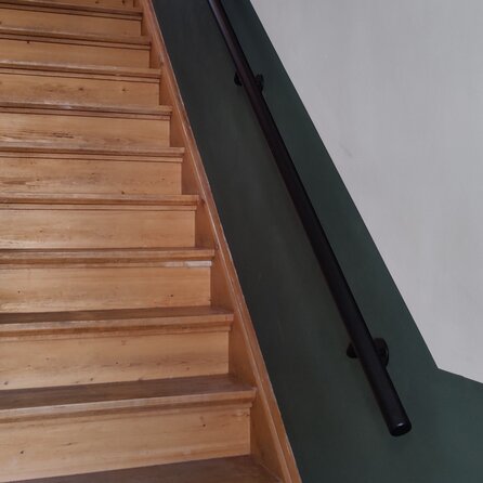 Zwarte trapleuning (gecoat) op maat - rond - incl. leuninghouders TYPE 3 - coating zwart RAL 9005