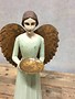 Wooden angel with plate