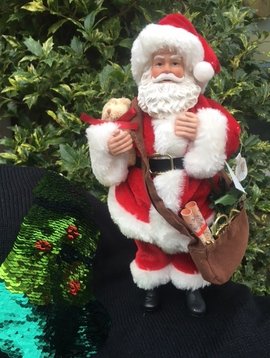 Goodwill Santa doll with bag