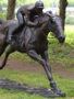 Bronzen paard met jockey