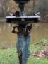 Bronze fountain with pigeons