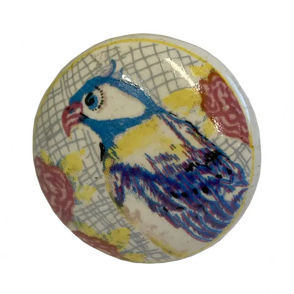  Kastknopje porselein rond vogel blauw