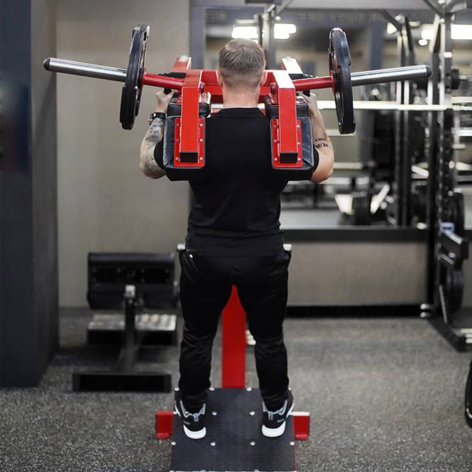 Front Squat and Calf Raises Machine (2R)