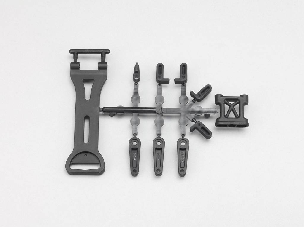 Yokomo Battery Mount / Servo Horn Set Yokomo Battery Mount / Servo Horn Set