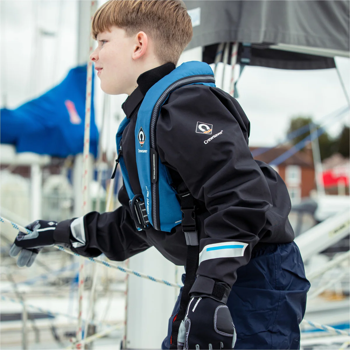 Crewsaver Reddingsvest Crewfit 150N Junior auto met harnas blauw/rood