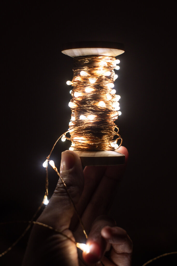 Lichterkette auf der Holzspule