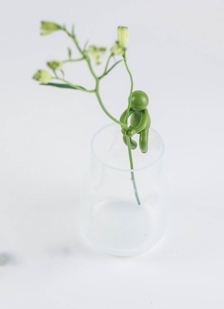 Grüner Pflanzenhalter