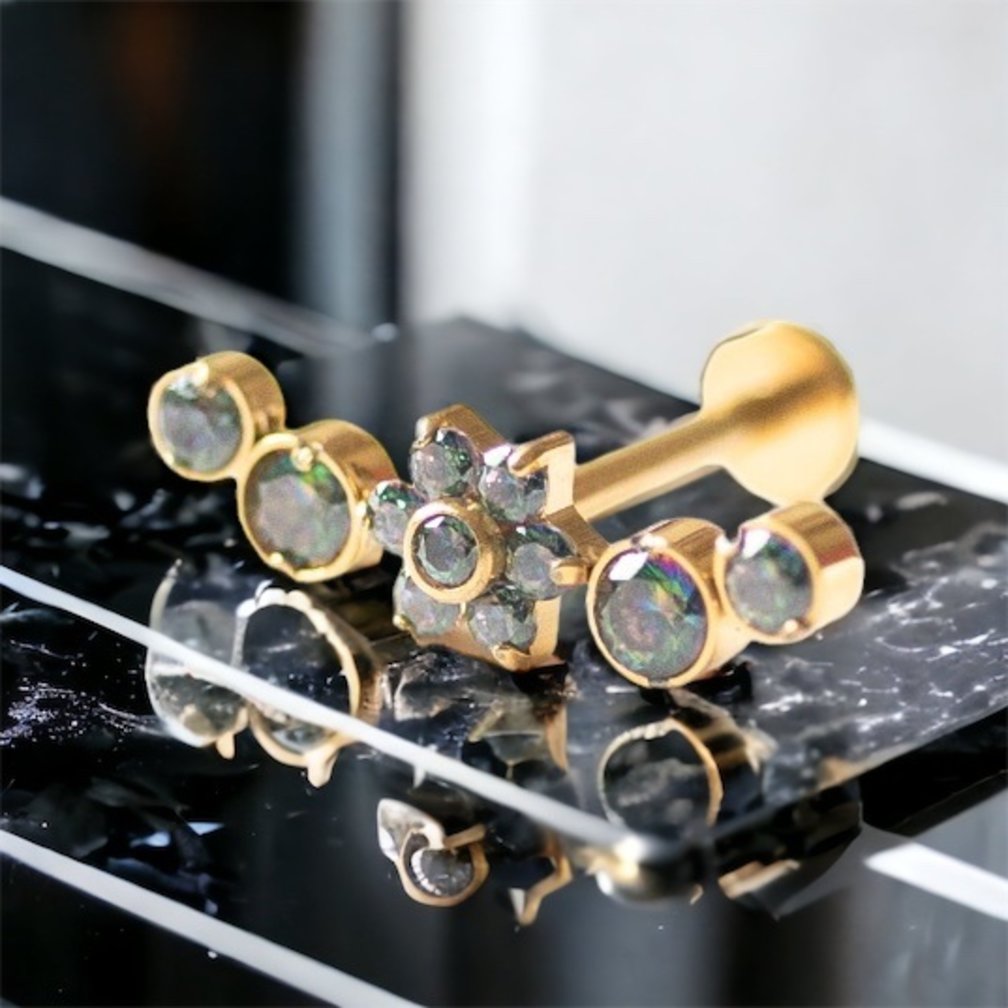 Stijlvolle en Opvallende Vergulde Barbell van Titanium - Met Bloemachtige Kristallen, Perfect voor Tragus Piercings