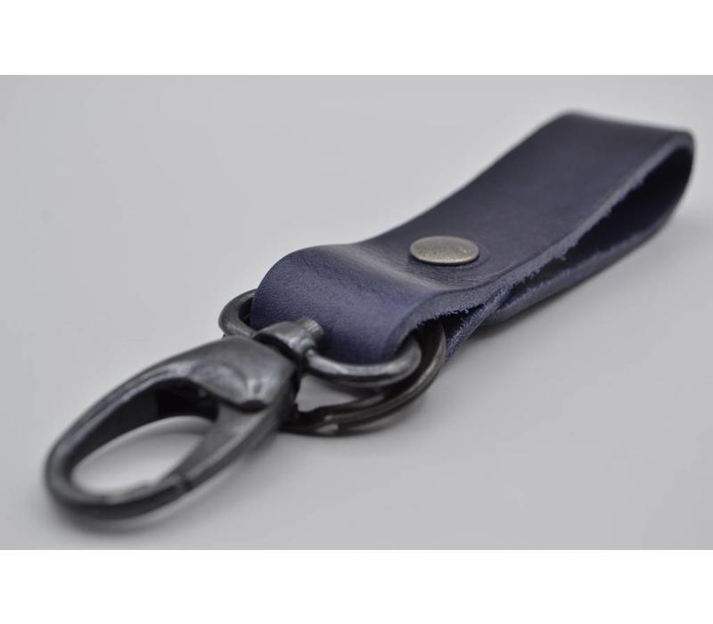 Deze blauwe sleutelhanger is te personaliseren met 30 karakters of een logo.