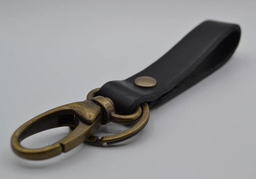 Scotts Bluf Sleutelhanger Brons met zwart Leer Scotts Bluf Sleutelhanger Brons met zwart Leer