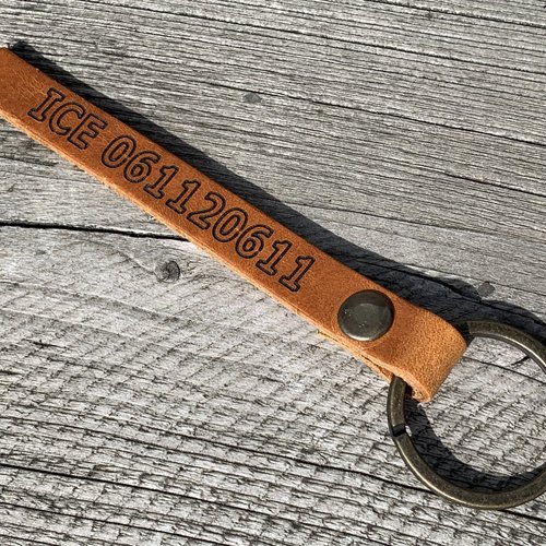 Sleutelhanger met telefoonnummer of tekst 