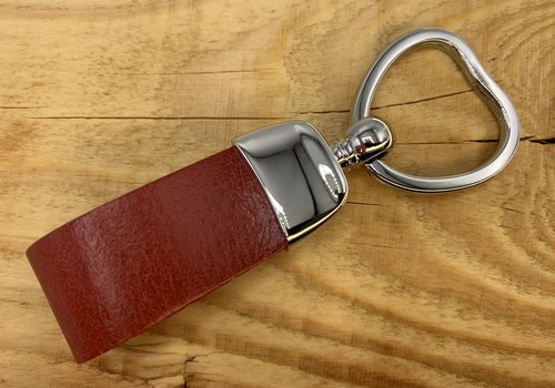 Scotts Bluf Rode sleutelhanger met hart vormige sleutelring. Scotts Bluf Rode sleutelhanger met hart vormige sleutelring.