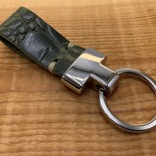 Groene luxe sleutelhanger met krokodillen print. 