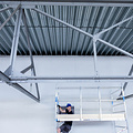 Alumexx Rolsteiger Alumexx Light 135x250 11,2m werkhoogte tegen de gevel