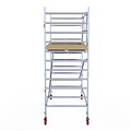 Euroscaffold Rolsteiger Euroscaffold Basic 135x305 4,2m werkhoogte carbon vloer tegen de gevel