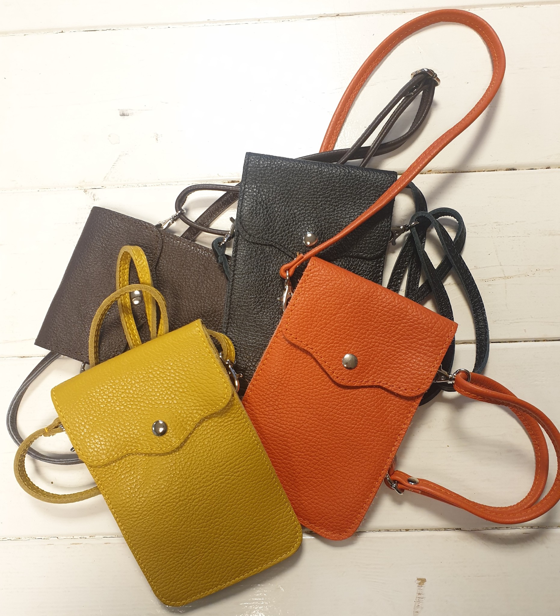 Leren telefoontasjes, heel goedkoop