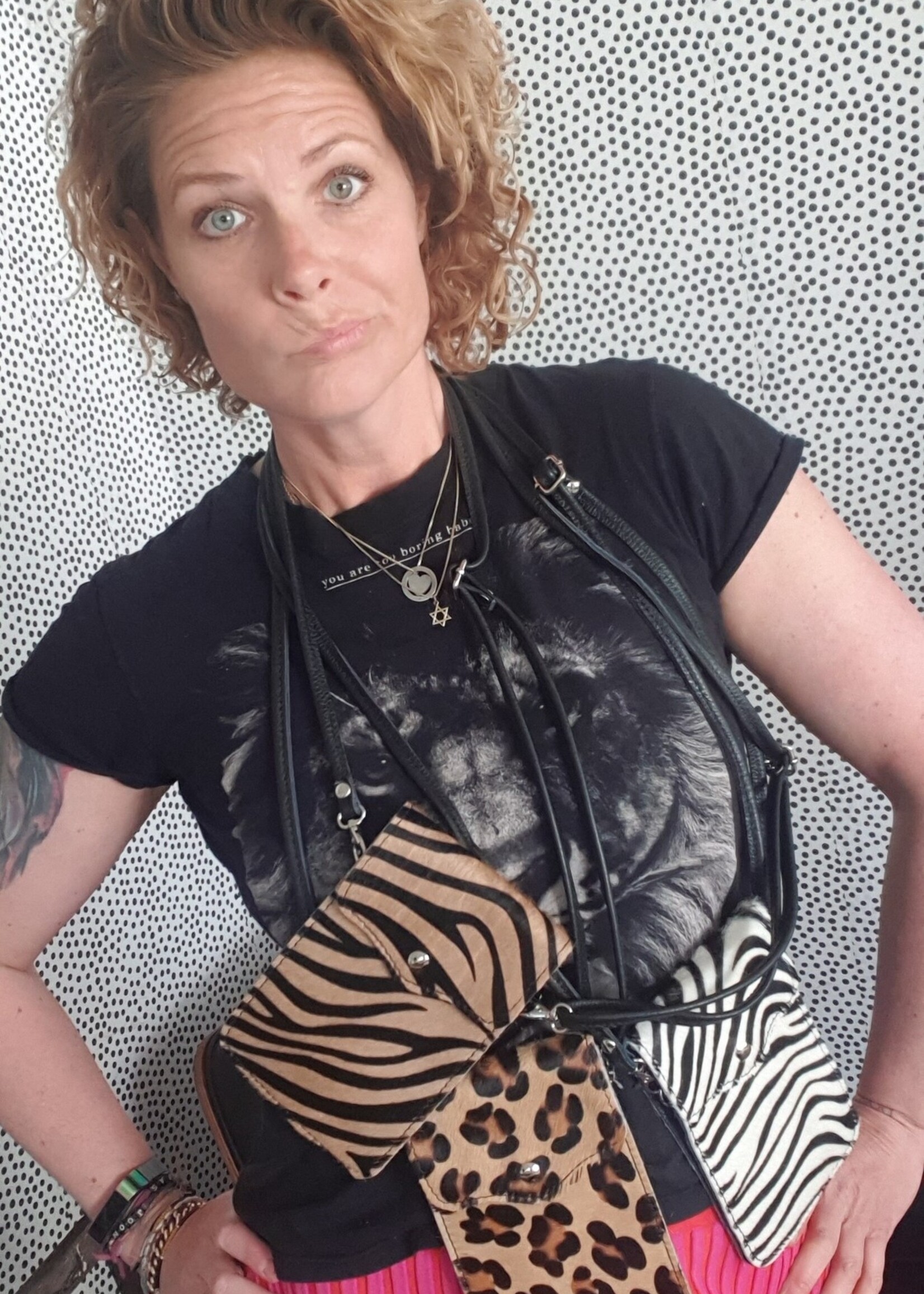 Leren telefoontasje met dierenprint. Panterprint & zebra