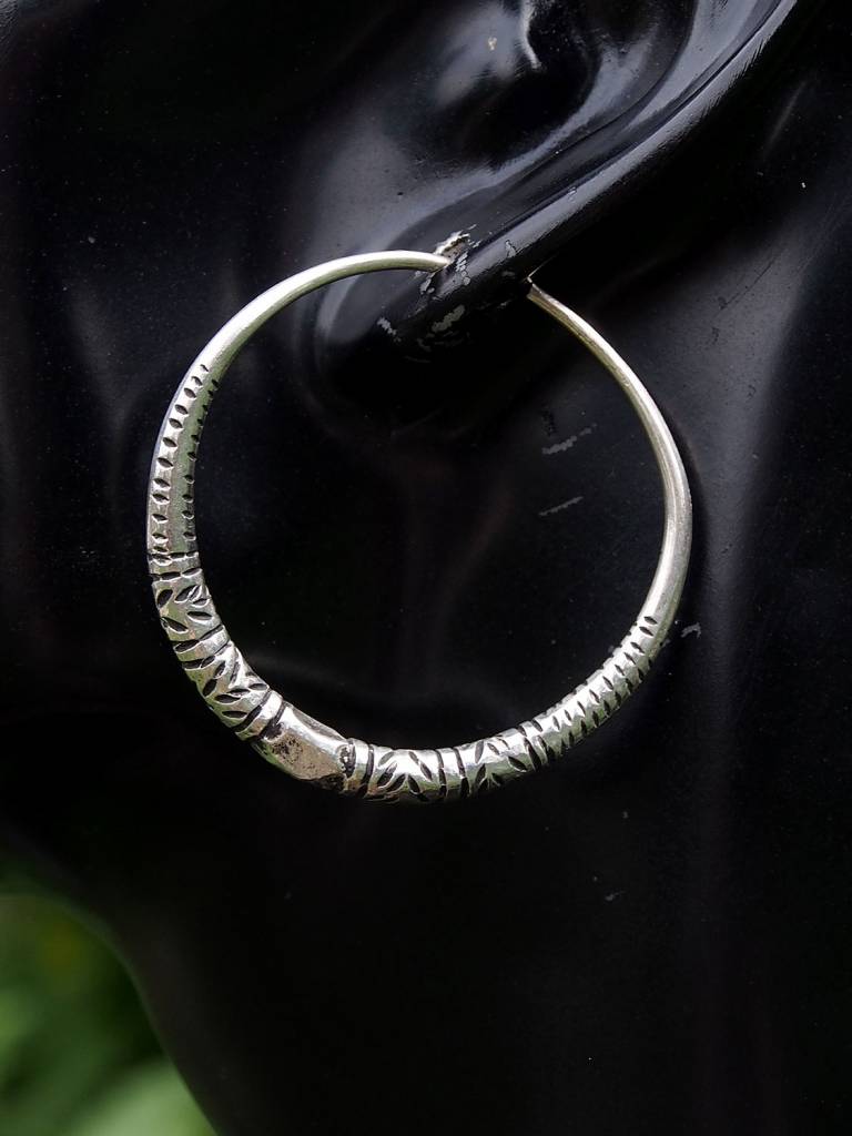 Antique handmade married women wedding nomadic Creolen earring Vintage silver hoops from Auristan Afghanistan Swat valley in Pakistan.