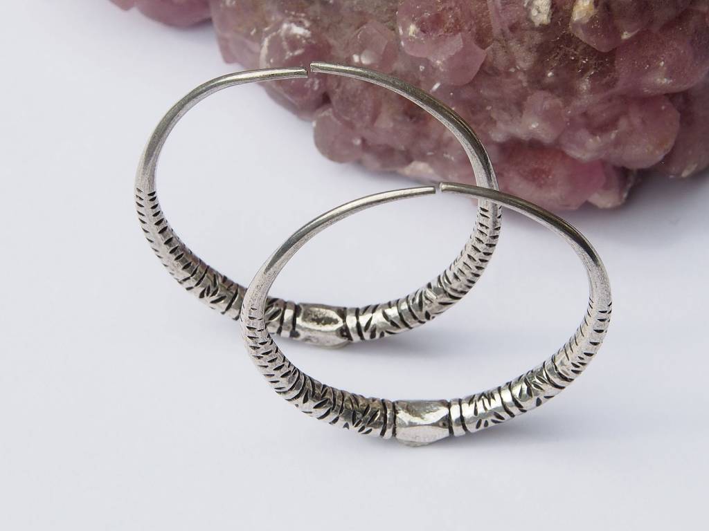 Antique handmade married women wedding nomadic Creolen earring Vintage silver hoops from Auristan Afghanistan Swat valley in Pakistan.